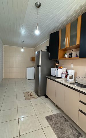 Casa à venda com 140m², 3 quartos e 2 vagas Casa à venda com 140m², 3 quartos e 2 vagasCozinha