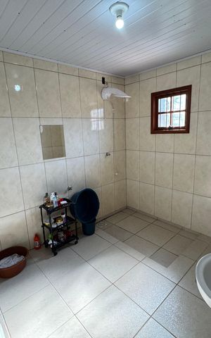 Casa à venda com 140m², 3 quartos e 2 vagas Casa à venda com 140m², 3 quartos e 2 vagasBanheiro