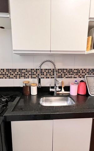 Apartamento à venda com 48m², 2 quartos e 1 vaga Apartamento à venda com 48m², 2 quartos e 1 vagaCozinha e Área de Serviço