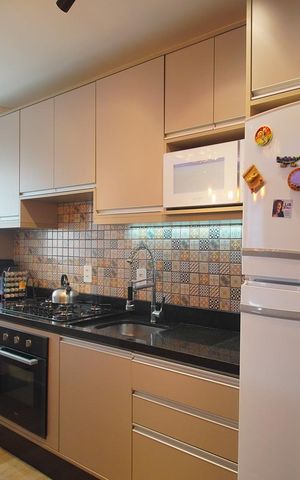 Apartamento à venda com 55m², 2 quartos e 1 vaga Apartamento à venda com 55m², 2 quartos e 1 vagaCozinha