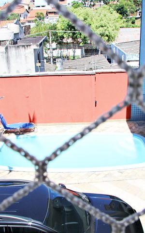 Casa à venda com 278m², 4 quartos e 6 vagasVaranda da suíte 1 com vista p piscina