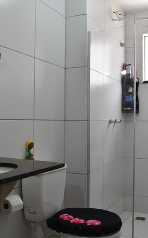 Casa de condomínio à venda com 110m², 3 quartos e 2 vagasBanheiro 2