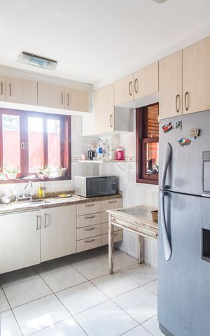 Casa de condomínio para alugar com 310m², 3 quartos e 6 vagasCozinha