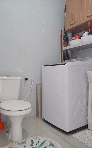Casa à venda com 150m², 3 quartos e 2 vagas Casa à venda com 150m², 3 quartos e 2 vagasBanheiro 2