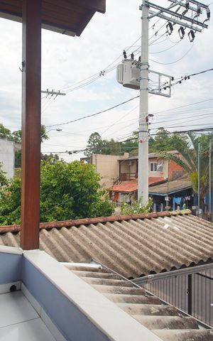 Casa à venda com 150m², 3 quartos e 2 vagas Casa à venda com 150m², 3 quartos e 2 vagasVaranda do Quarto 3