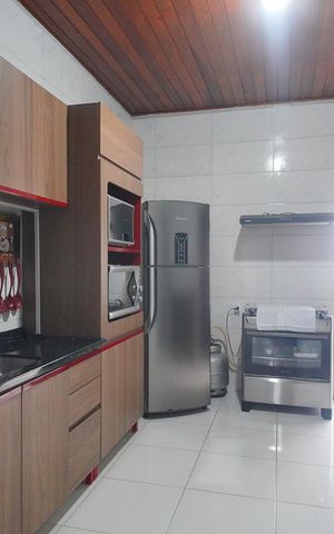 Casa à venda com 150m², 3 quartos e 2 vagas Casa à venda com 150m², 3 quartos e 2 vagasCozinha