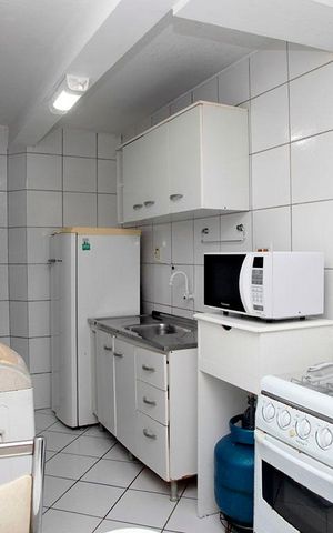 Apartamento à venda com 77m², 2 quartos e sem vagaCozinha + Área de Serviço 1