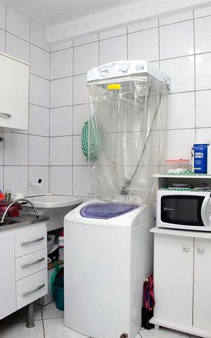 Apartamento à venda com 77m², 2 quartos e sem vagaCozinha + Área de Serviço 2