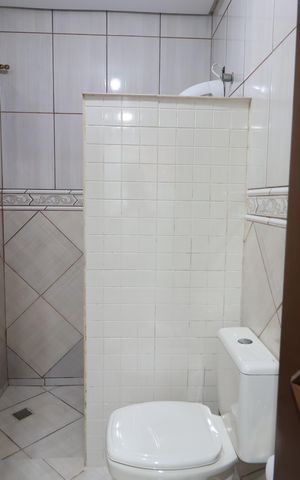 Casa à venda com 340m², 4 quartos e 4 vagasBanheiro casa 1