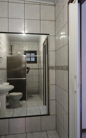 Casa à venda com 340m², 4 quartos e 4 vagasBanheiro Casa 2