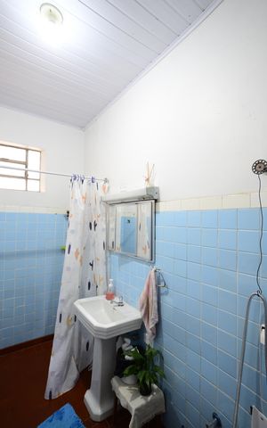 Casa à venda com 102m², 3 quartos e 1 vagaBanheiro