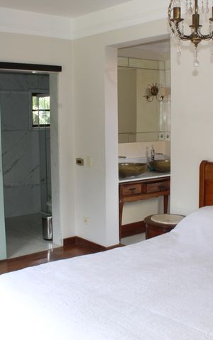 Casa de condomínio para alugar com 750m², 4 quartos e 3 vagasSuíte 1
