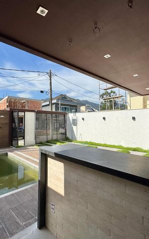 Casa de condomínio à venda com 180m², 4 quartos e 2 vagas Casa de condomínio à venda com 180m², 4 quartos e 2 vagasÁrea externa