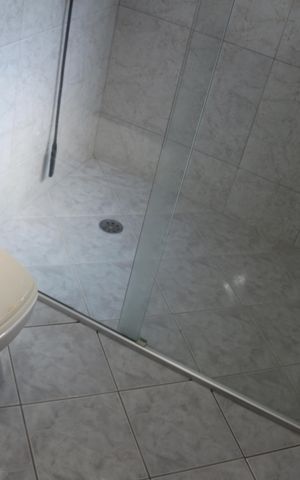 Casa à venda com 253m², 3 quartos e 5 vagasBanheiro da Suíte 2