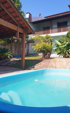 Casa à venda com 296m², 4 quartos e 2 vagas Casa à venda com 296m², 4 quartos e 2 vagasPiscina