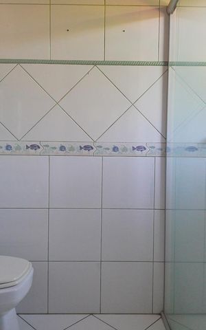 Casa à venda com 296m², 4 quartos e 2 vagas Casa à venda com 296m², 4 quartos e 2 vagasBanheiro da Suíte