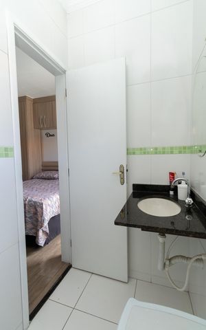 Casa de condomínio à venda com 113m², 2 quartos e 3 vagasBanheiro da Suíte 2