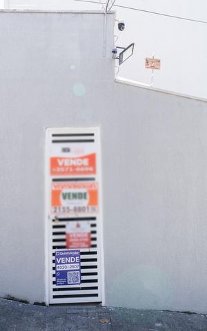 Casa de condomínio à venda com 113m², 2 quartos e 3 vagasFachada + Plaquinha
