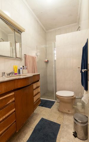 Casa à venda com 134m², 3 quartos e 2 vagasBanheiro da Suíte