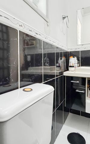 Casa à venda com 150m², 3 quartos e 2 vagas Casa à venda com 150m², 3 quartos e 2 vagasBanheiro da Suíte 1