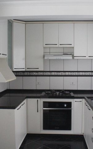 Casa de condomínio para alugar com 200m², 3 quartos e 3 vagasCozinha