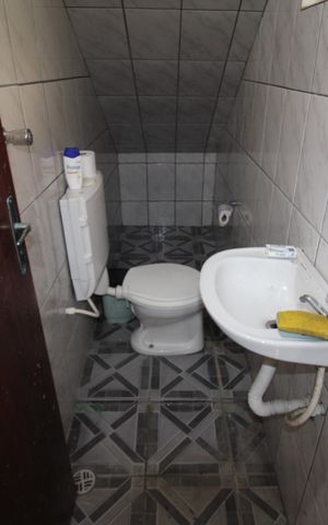 Casa à venda com 315m², 4 quartos e 8 vagasGaragem - Banheiro