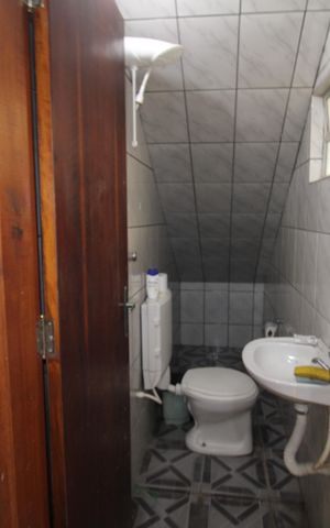 Casa à venda com 315m², 4 quartos e 8 vagasGaragem - Banheiro