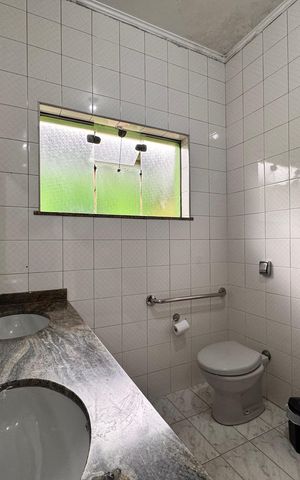 Casa à venda com 205m², 4 quartos e 3 vagas Casa à venda com 205m², 4 quartos e 3 vagasBanheiro 2