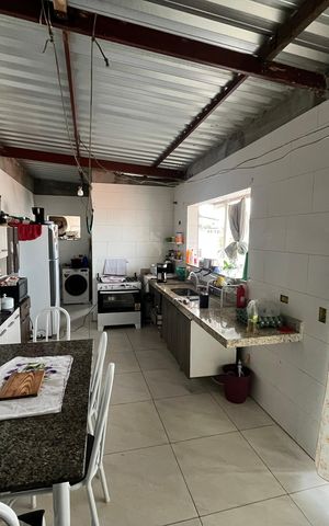 Casa à venda com 450m², 3 quartos e 2 vagasSala/Cozinha