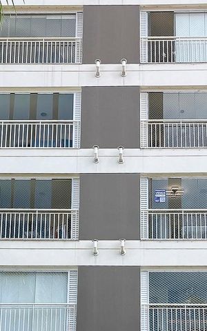 Apartamento à venda com 75m², 3 quartos e 2 vagasFachada + plaquinha