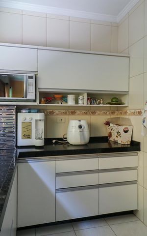 Casa à venda com 300m², 4 quartos e 4 vagas Casa à venda com 300m², 4 quartos e 4 vagasCozinha