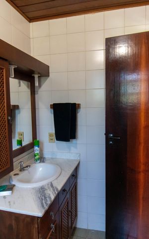 Casa de condomínio à venda com 456m², 6 quartos e 5 vagas Casa de condomínio à venda com 456m², 6 quartos e 5 vagasBanheiro da Suíte 2