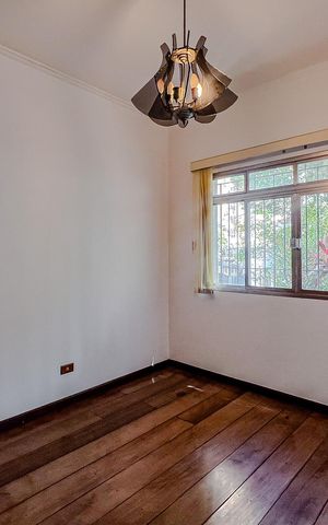 Casa à venda com 283m², 5 quartos e 2 vagasQuarto 1