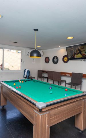 Apartamento à venda com 63m², 2 quartos e 1 vaga Apartamento à venda com 63m², 2 quartos e 1 vagaÁrea comum - Salão de jogos