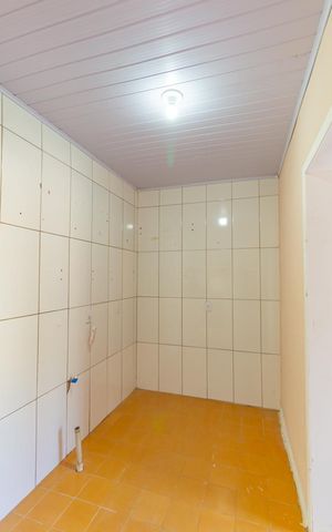 Casa à venda com 86m², 3 quartos e sem vaga Casa à venda com 86m², 3 quartos e sem vagaCozinha