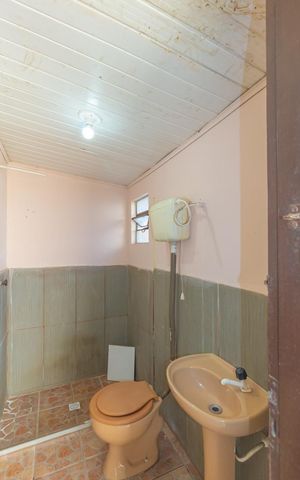 Casa à venda com 86m², 3 quartos e sem vaga Casa à venda com 86m², 3 quartos e sem vagaBanheiro de serviço