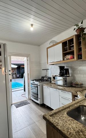Casa à venda com 180m², 2 quartos e 2 vagas Casa à venda com 180m², 2 quartos e 2 vagasCozinha