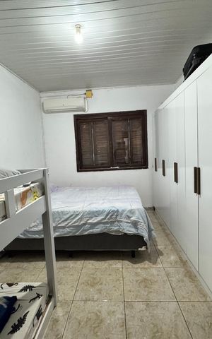 Casa à venda com 180m², 2 quartos e 2 vagas Casa à venda com 180m², 2 quartos e 2 vagasQuarto 2