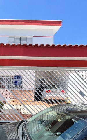 Casa à venda com 187m², 3 quartos e 2 vagas Casa à venda com 187m², 3 quartos e 2 vagasFachada e placa