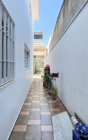 Casa à venda com 187m², 3 quartos e 2 vagas Casa à venda com 187m², 3 quartos e 2 vagasQuintal lateral