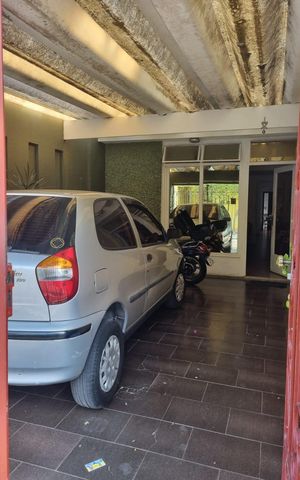 Casa à venda com 149m², 3 quartos e 1 vaga Casa à venda com 149m², 3 quartos e 1 vagaGaragem
