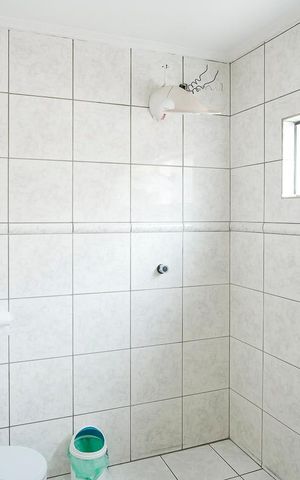 Casa à venda com 360m², 4 quartos e 6 vagasBanheiro da suíte 2