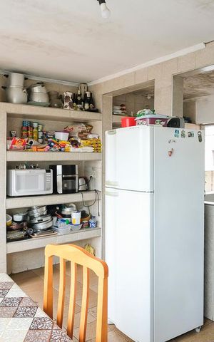 Casa à venda com 360m², 4 quartos e 6 vagasCozinha 2 e área de serviço