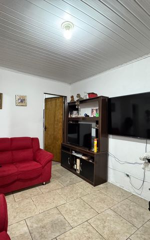 Casa à venda com 120m², 2 quartos e 2 vagas Casa à venda com 120m², 2 quartos e 2 vagasSala