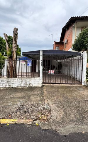 Casa à venda com 120m², 2 quartos e 2 vagas Casa à venda com 120m², 2 quartos e 2 vagasFachada e placa