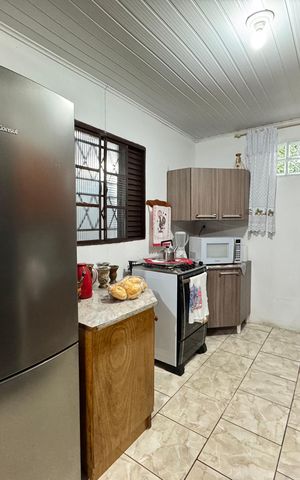 Casa à venda com 120m², 2 quartos e 2 vagas Casa à venda com 120m², 2 quartos e 2 vagasCozinha