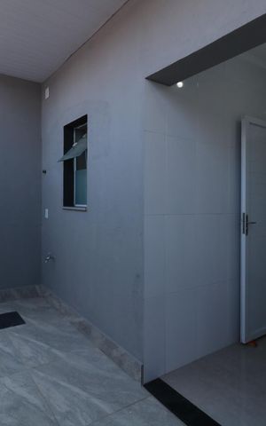 Casa à venda com 134m², 2 quartos e 2 vagasCorredor externo