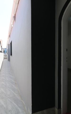 Casa à venda com 134m², 2 quartos e 2 vagasCorredor externo