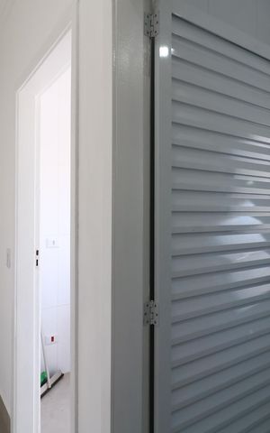 Casa à venda com 134m², 2 quartos e 2 vagasCorredor interno
