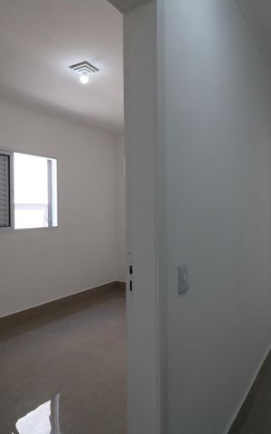 Casa à venda com 134m², 2 quartos e 2 vagasCorredor interno